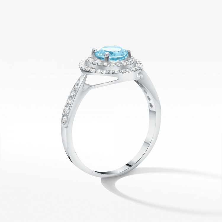 Pierścionek z białego złota z topazem