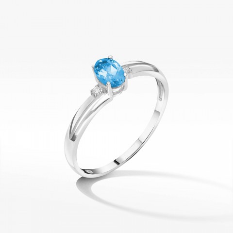 Złoty pierścionek z topazem i diamentami