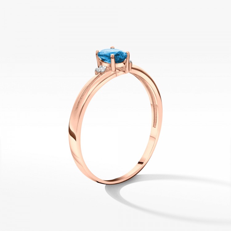 Złoty pierścionek z topazem i diamentami