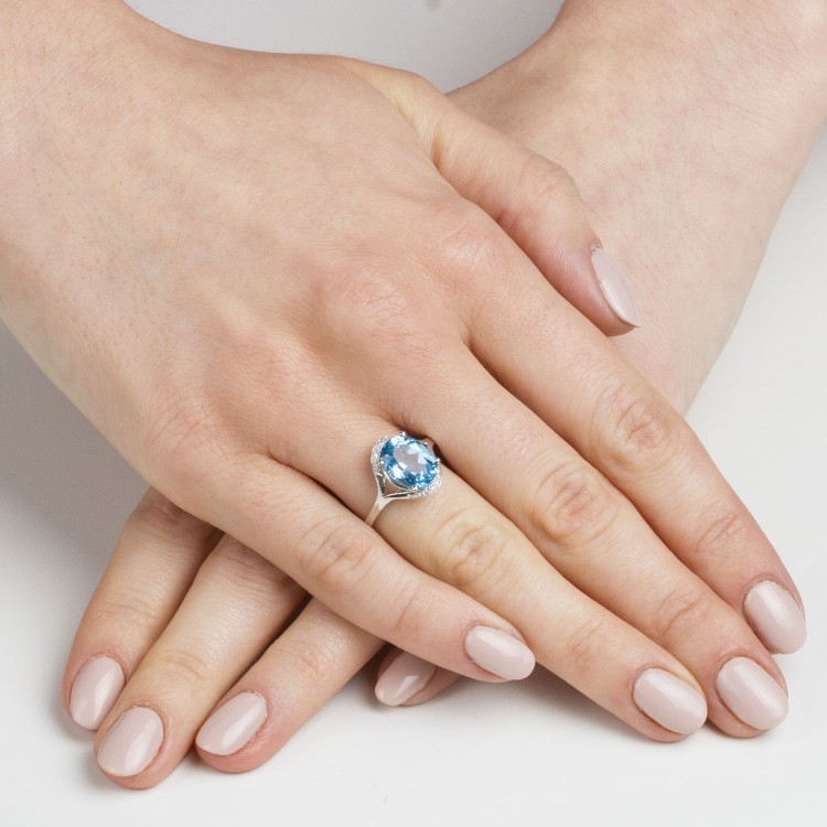 Pierścionek zaręczynowy z różowego złota z topazem