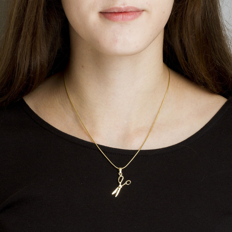 Zawieszka ze złota fryzjerstwo