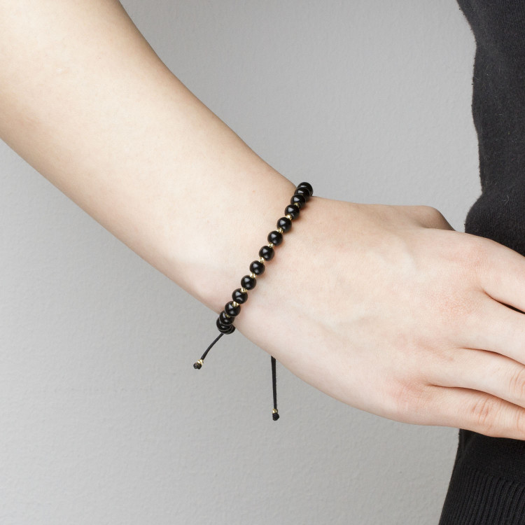 Bransoletka ze złota na sznurku