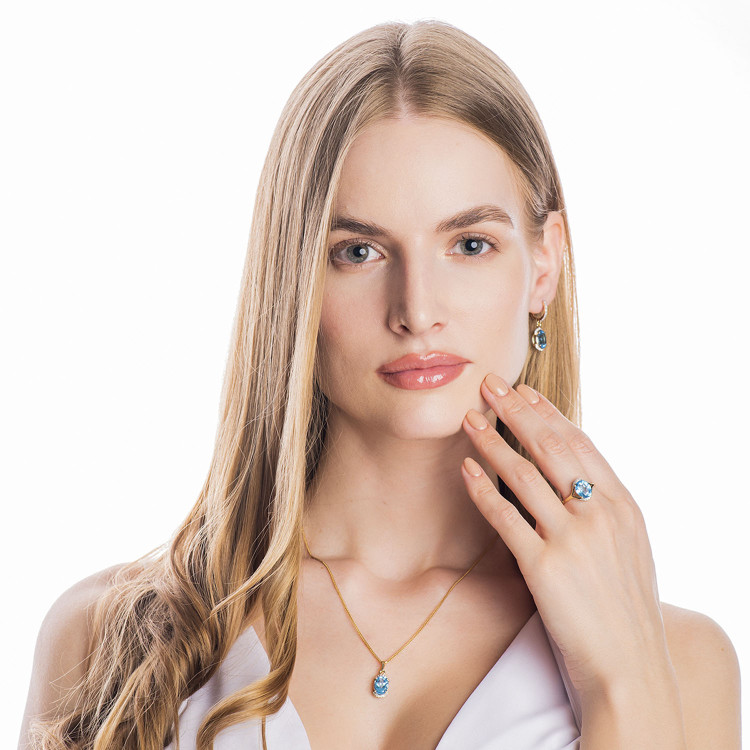 Pierścionek zaręczynowy z żółtego złota z topazem