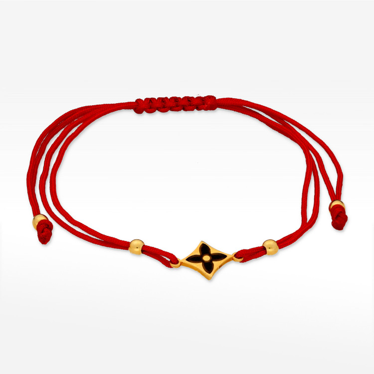 Bransoletka ze złota na czerwonym sznurku
