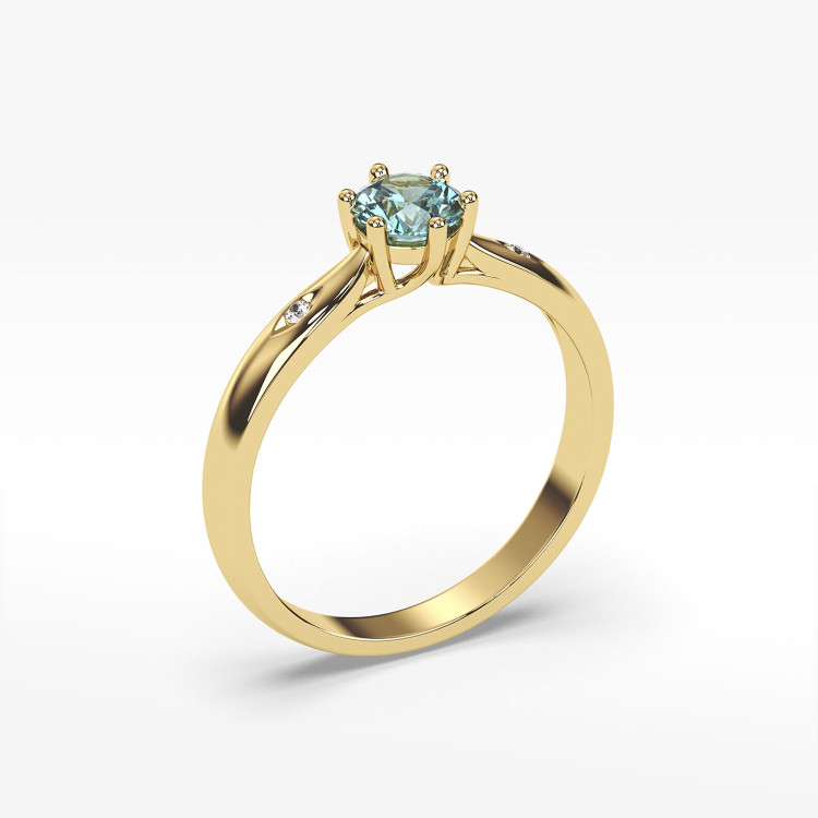 Złoty pierścionek z topazem