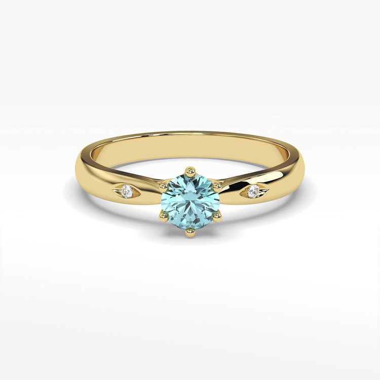 Złoty pierścionek z topazem