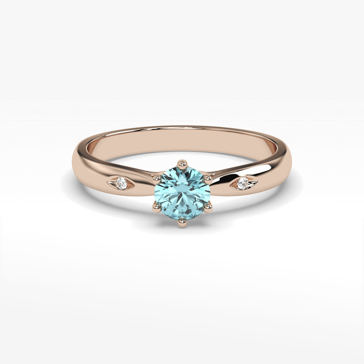 Złoty pierścionek z topazem