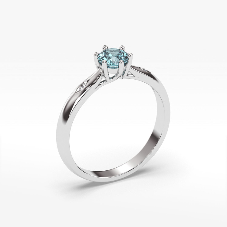 Złoty pierścionek z topazem