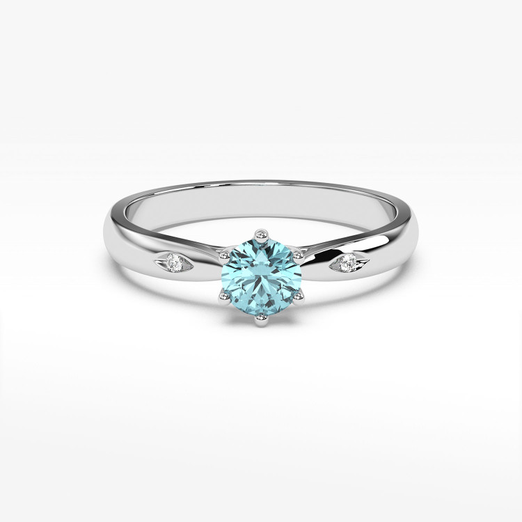 Złoty pierścionek z topazem