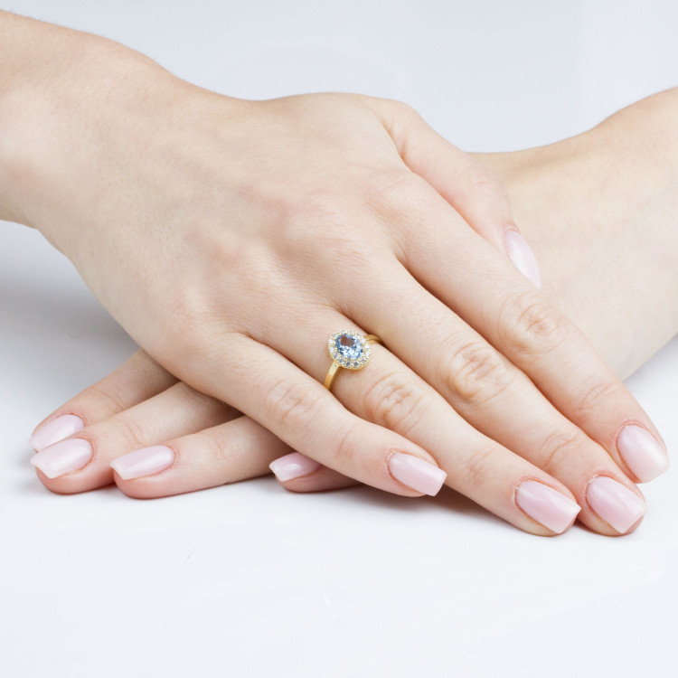 Pierścionek ze złota z niebieską cyrkonią