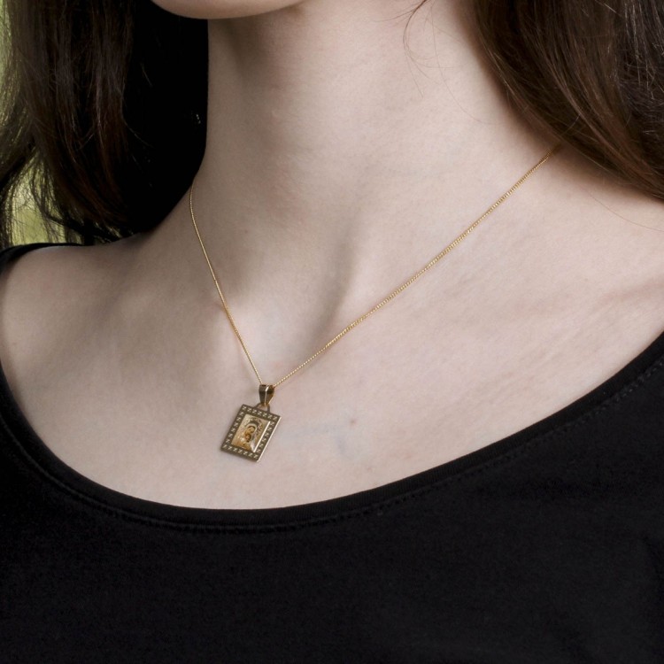 Złota zawieszka medalik