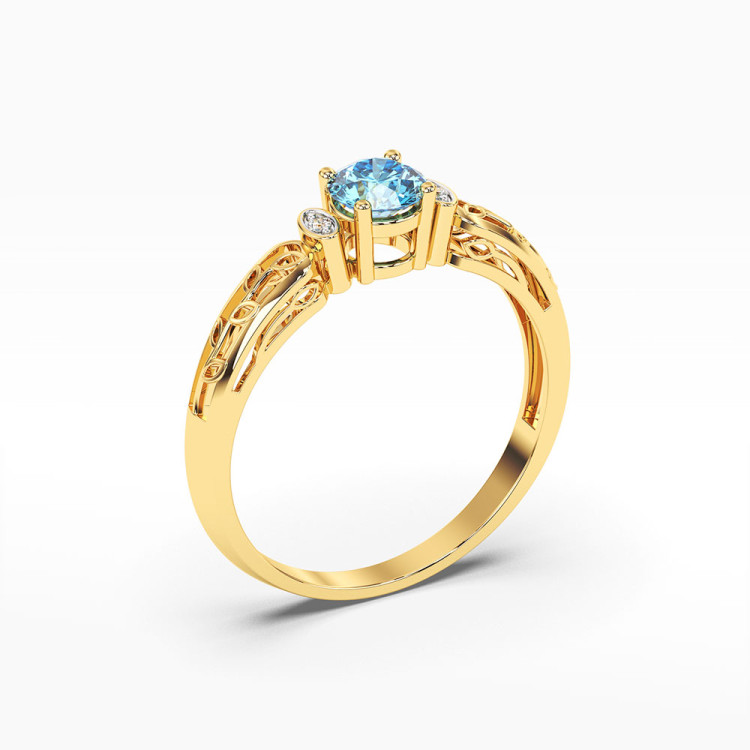 Pierścionek z żółtego złota z topazem