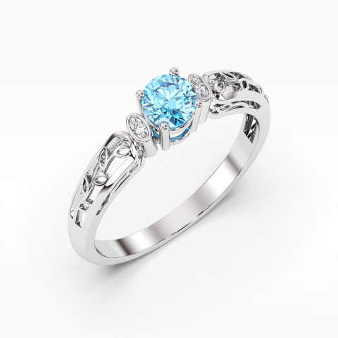 Pierścionek z białego złota z topazem