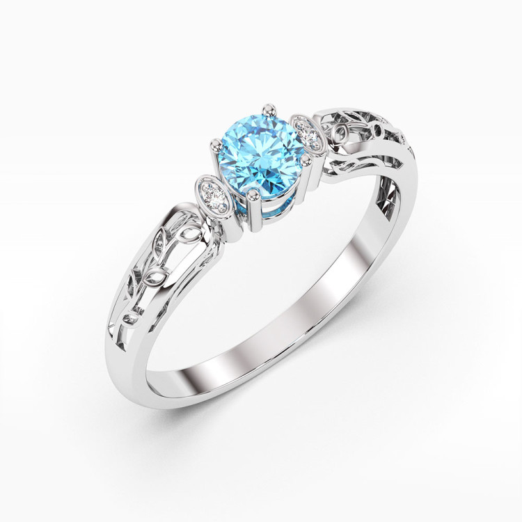 Pierścionek z białego złota z topazem