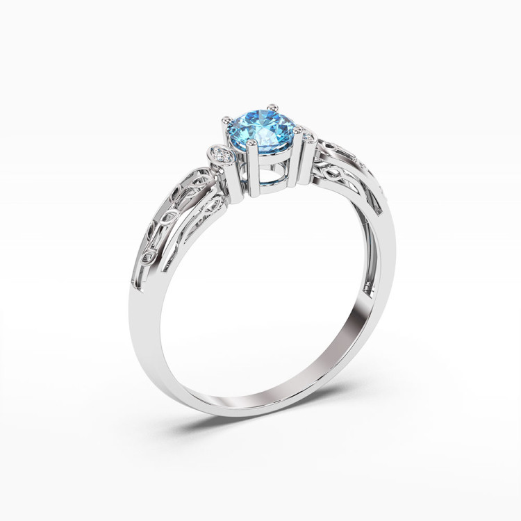 Pierścionek z białego złota z topazem