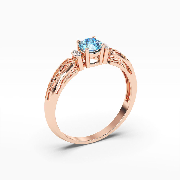 Pierścionek z różowego złota z topazem