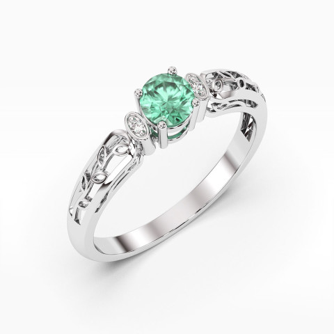 Pierścionek z białego złota z szmaragdem