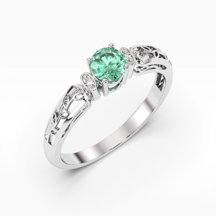 Pierścionek z białego złota z szmaragdem