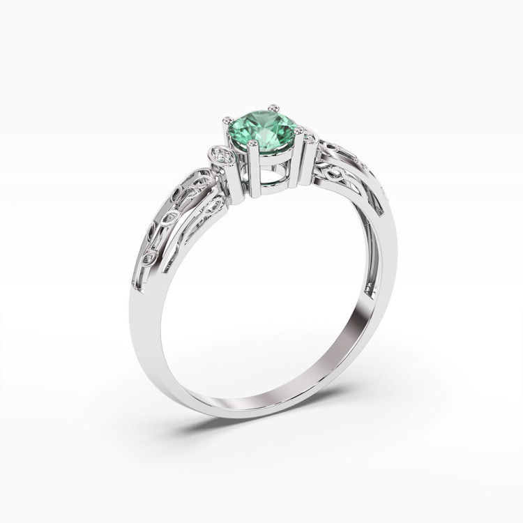 Pierścionek z białego złota z szmaragdem