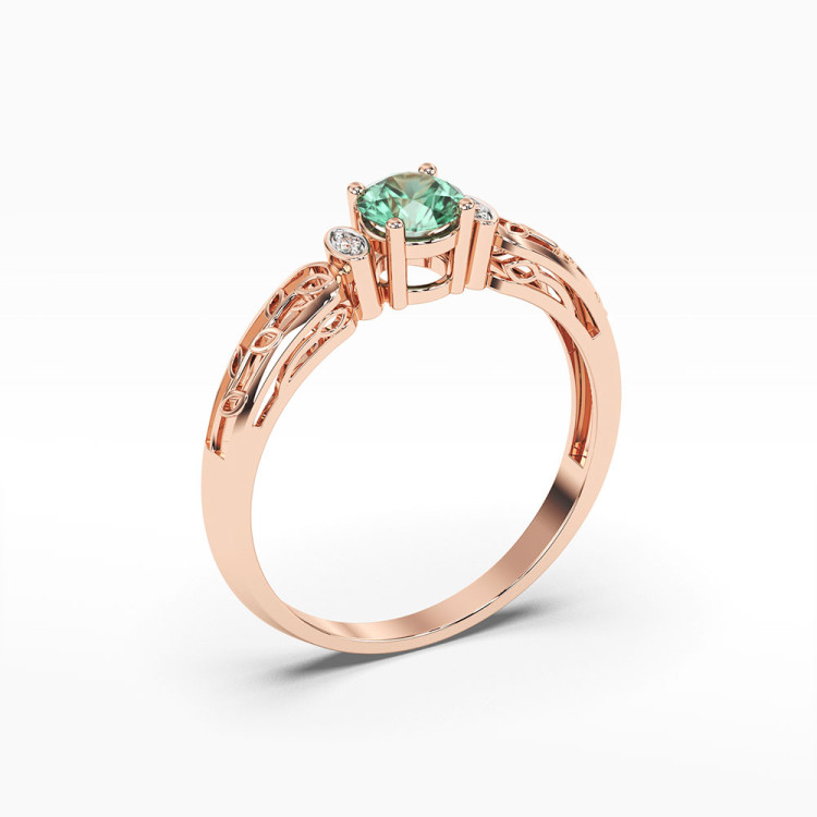 Pierścionek z różowego złota z szmaragdem