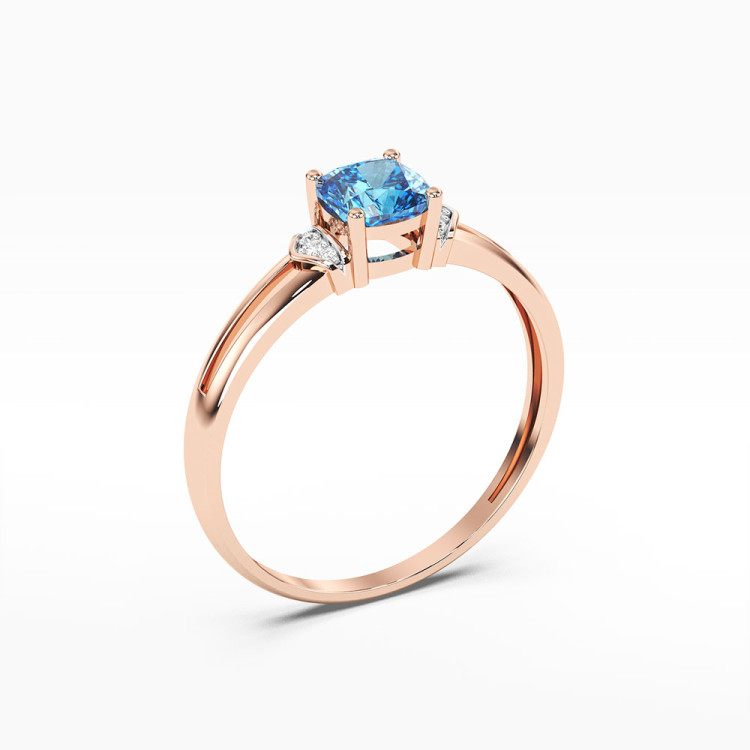 Pierścionek z różowego złota z topazem
