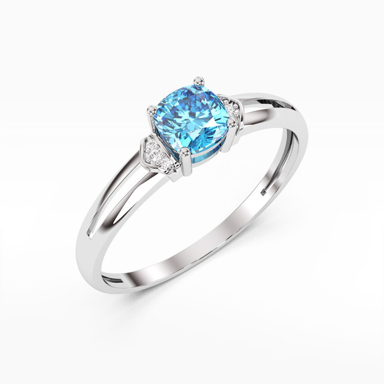Pierścionek z białego złota z topazem