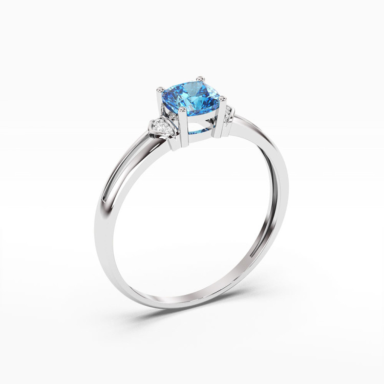 Pierścionek z białego złota z topazem