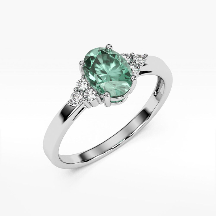 Pierścionek ze złota ze szmaragdem i diamentami