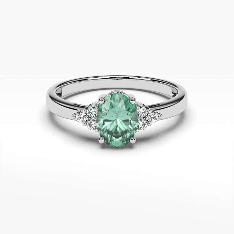 Pierścionek ze złota ze szmaragdem i diamentami