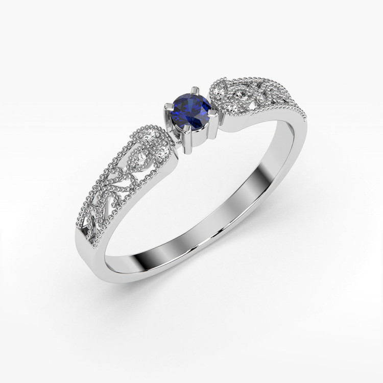 Pierścionek z diamentami i szafirem