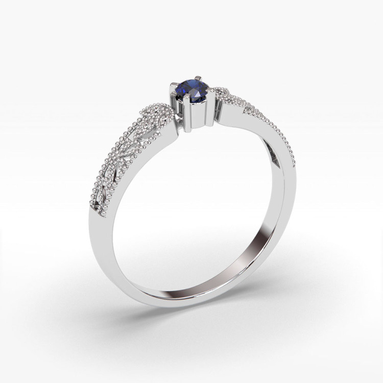 Pierścionek z diamentami i szafirem