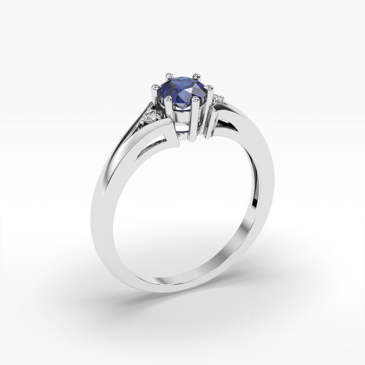 Złoty pierścionek z szafirem