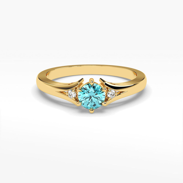 Złoty pierścionek z topazem