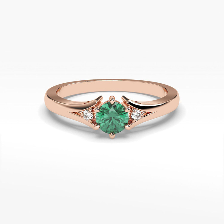 Pierścionek ze złota ze szmaragdem i diamentami