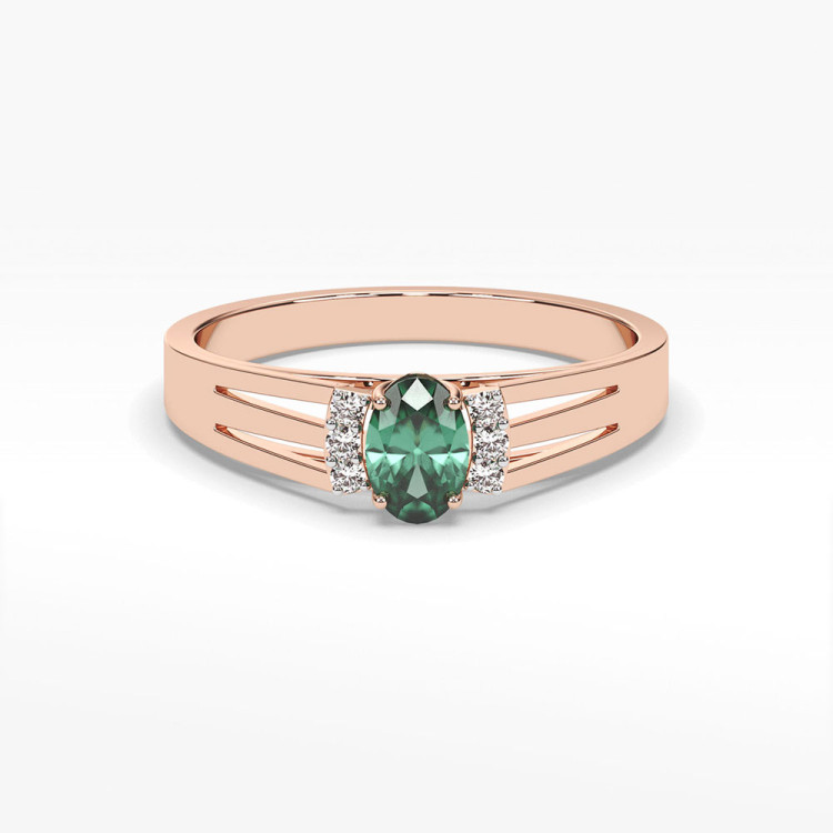 Pierścionek ze złota ze szmaragdem i diamentami