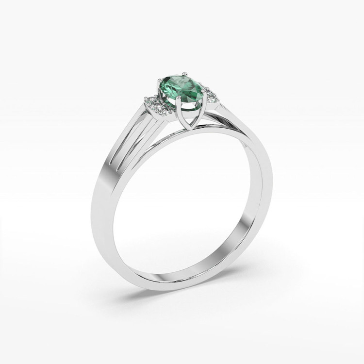 Pierścionek ze złota ze szmaragdem i diamentami