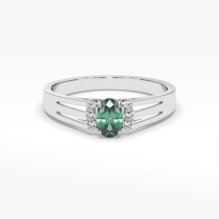 Pierścionek ze złota ze szmaragdem i diamentami