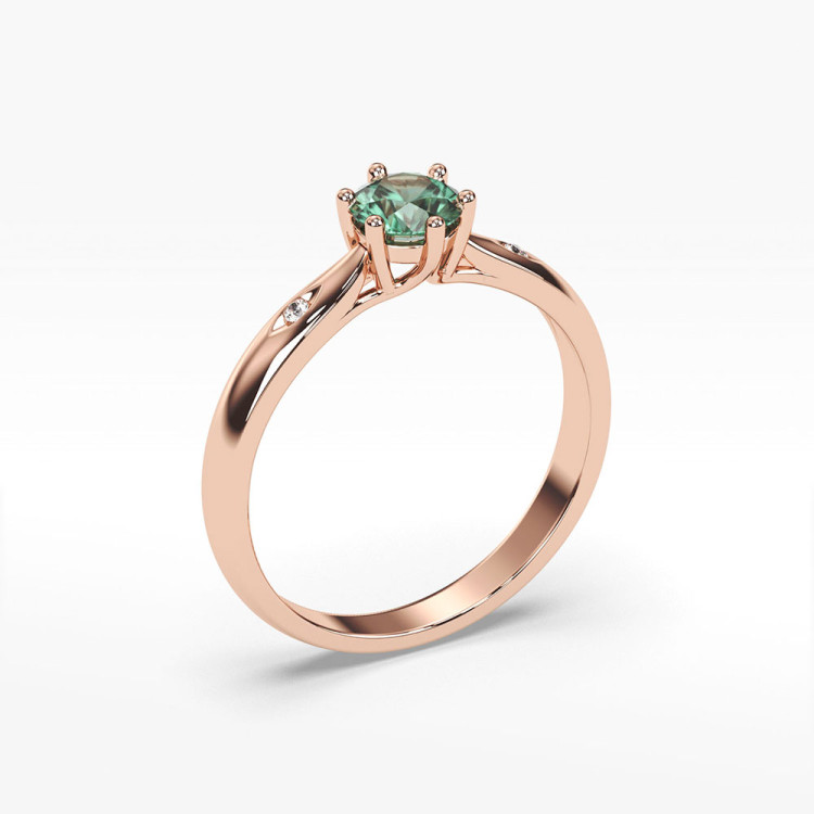 Pierścionek ze złota ze szmaragdem i diamentami