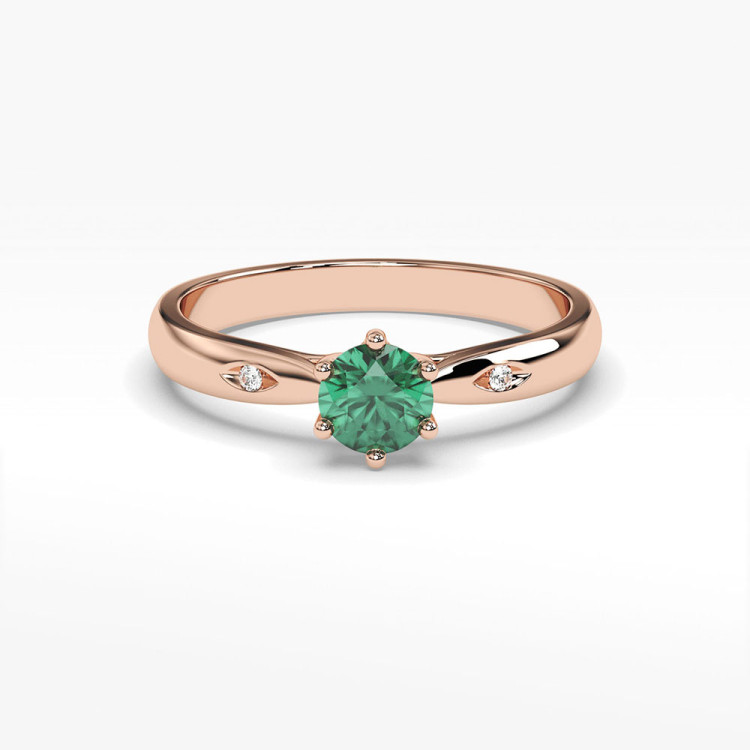 Pierścionek ze złota ze szmaragdem i diamentami