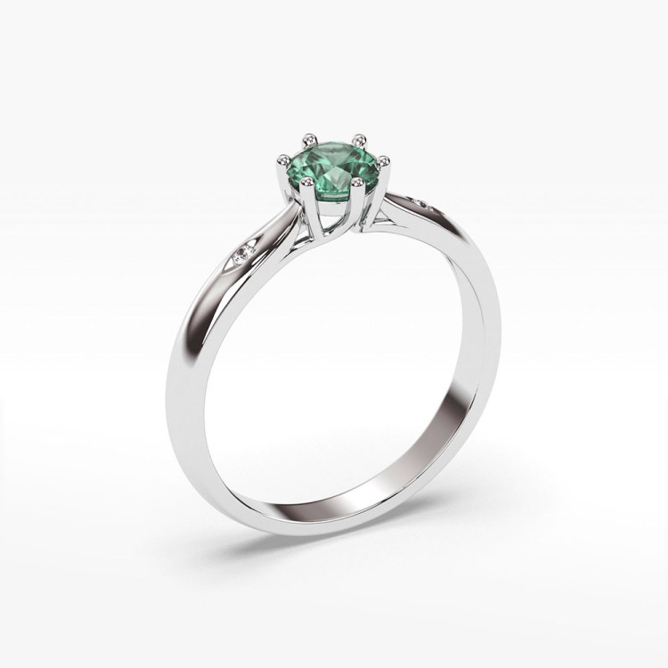 Pierścionek ze złota ze szmaragdem i diamentami