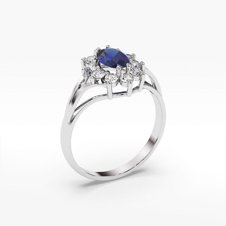 Pierścionek z diamentami oraz szafirem