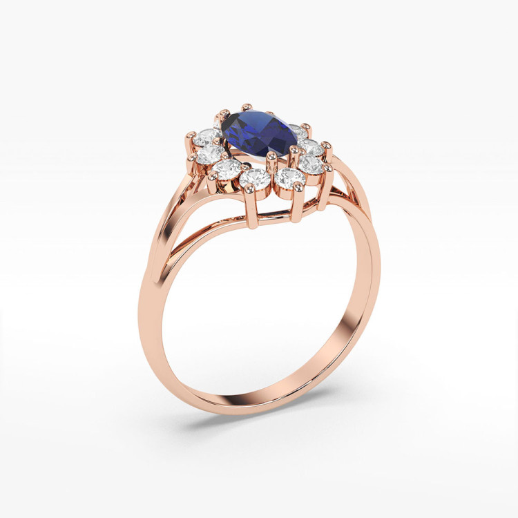 Pierścionek z diamentami oraz szafirem