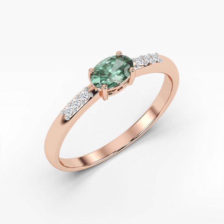 Pierścionek z różowego złota z szmaragdem