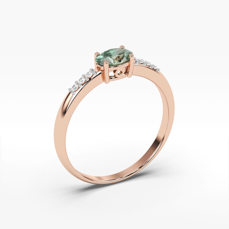 Pierścionek z różowego złota z szmaragdem