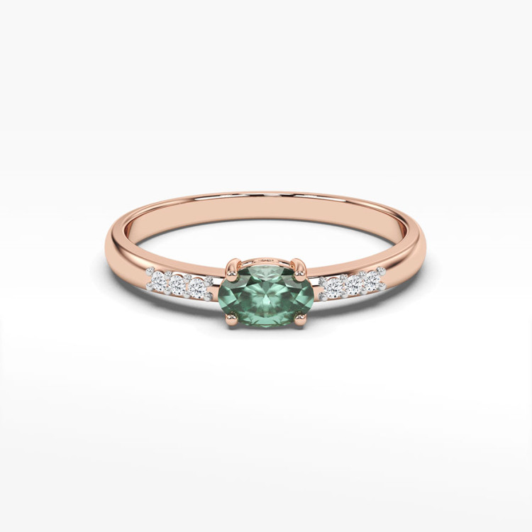 Pierścionek z różowego złota z szmaragdem