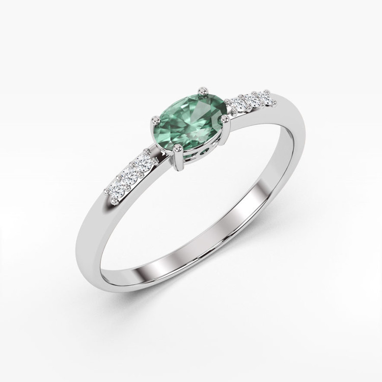 Pierścionek z białego złota z szmaragdem