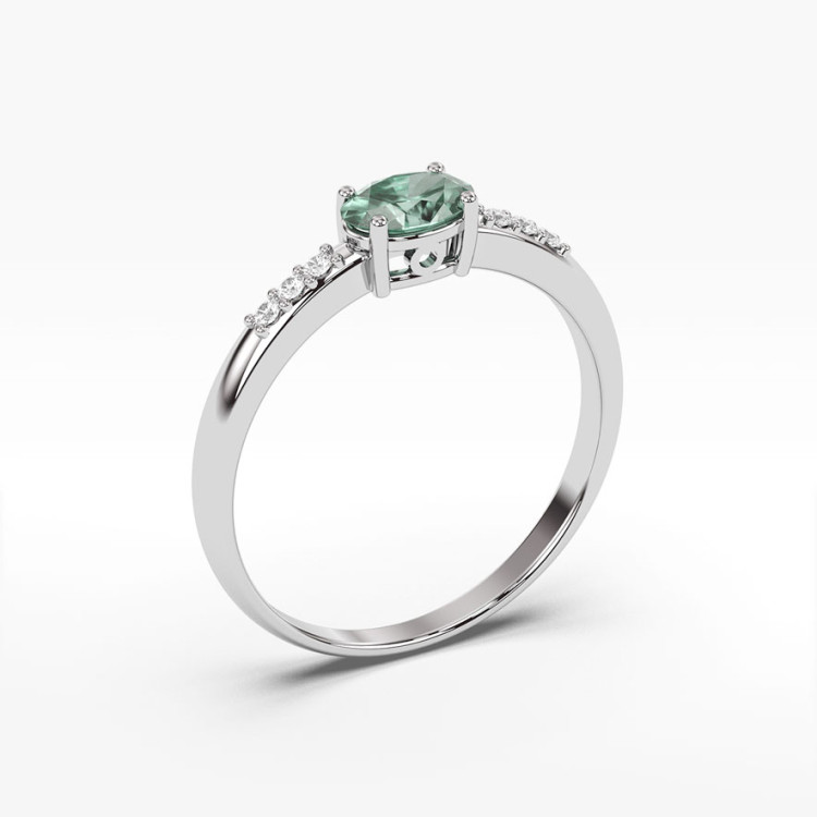 Pierścionek z białego złota z szmaragdem