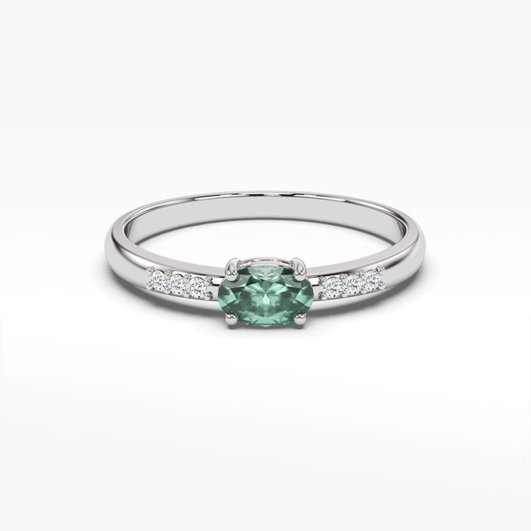 Pierścionek z białego złota z szmaragdem