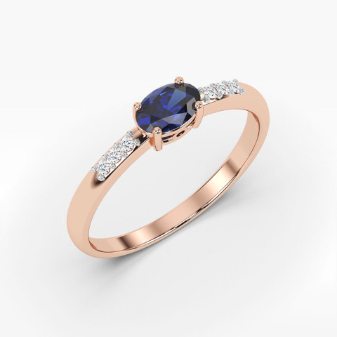 Pierścionek z rózowego złota z szafirem