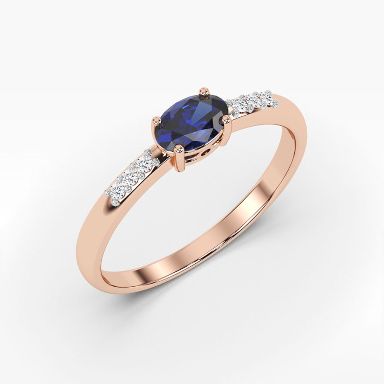 Pierścionek z rózowego złota z szafirem